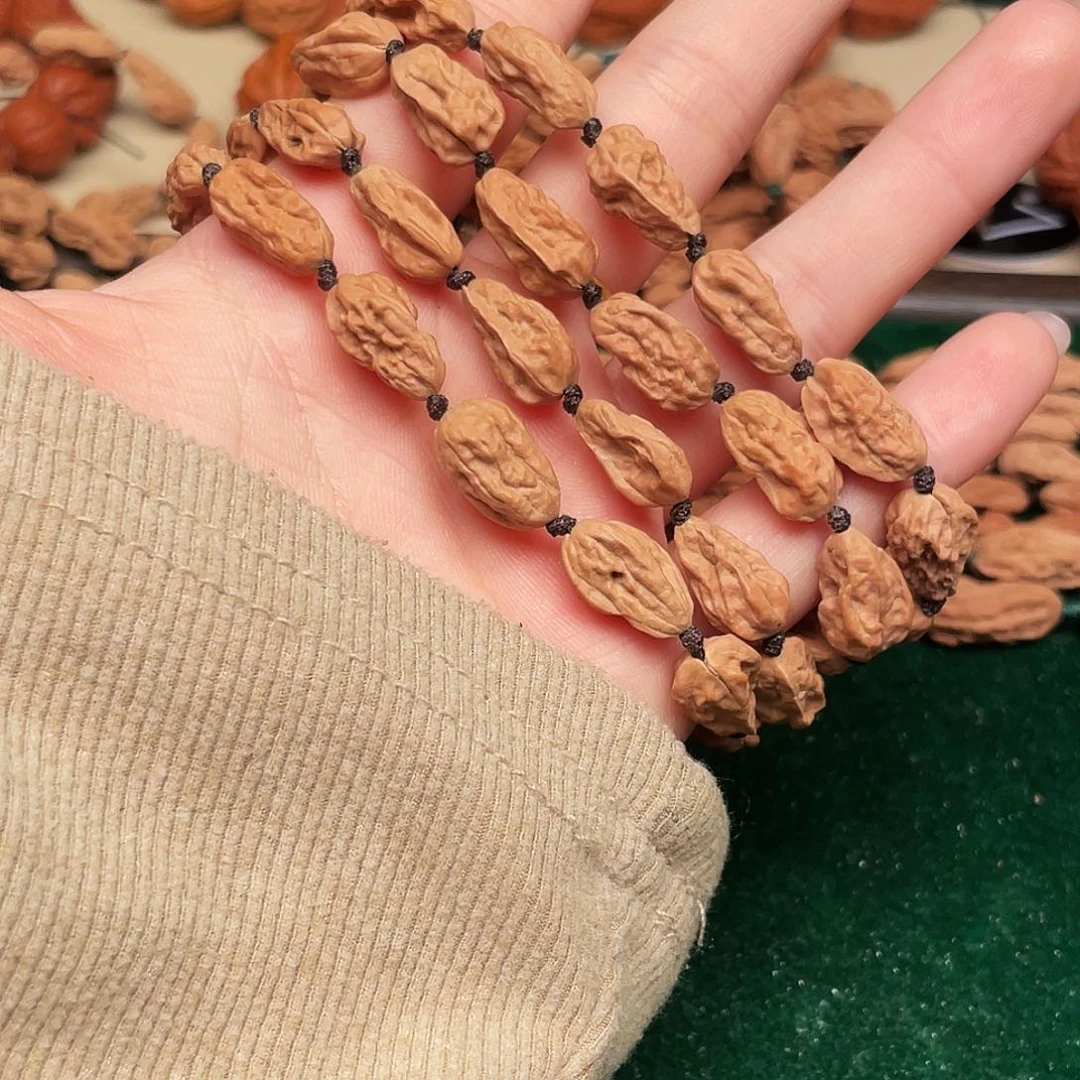 落***痕文玩核桃吊坠异形