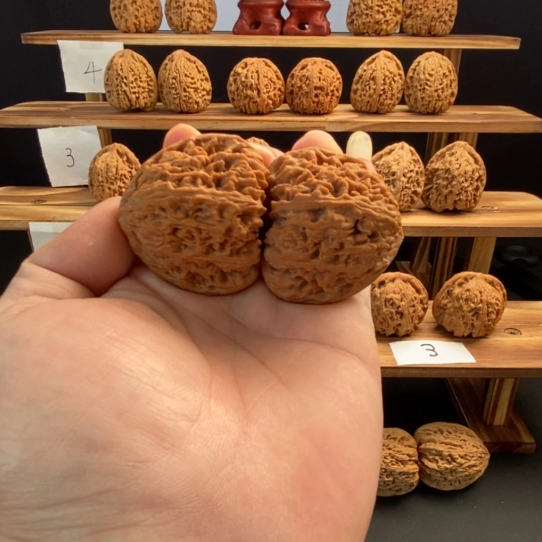 神****桃核把件南疆石三角桩尺寸43