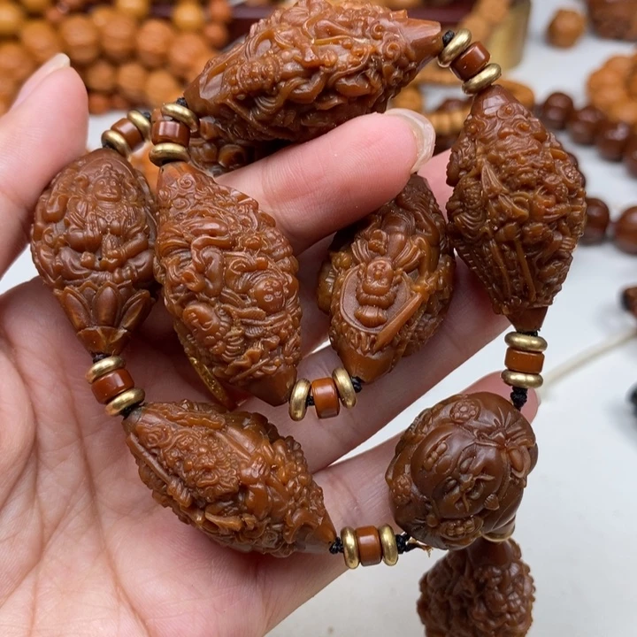 橄榄核吊坠天上人间