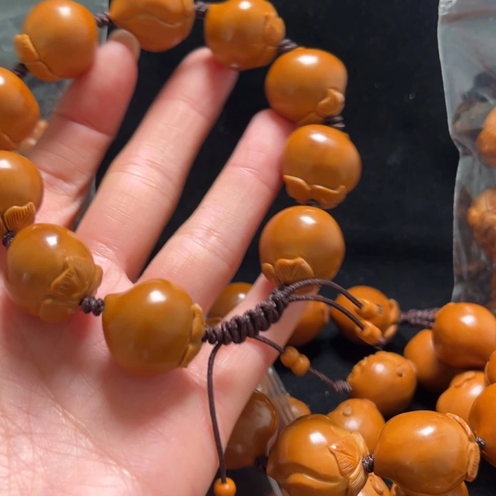 是***仔橄榄核手串寿桃18