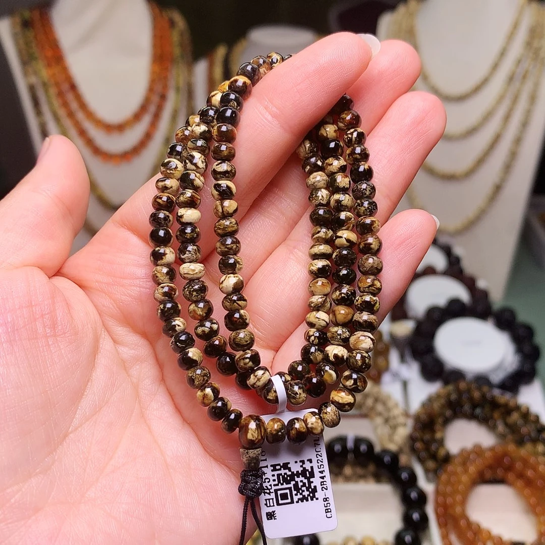 琥珀未镶嵌裸石5/黑白妖花118-58