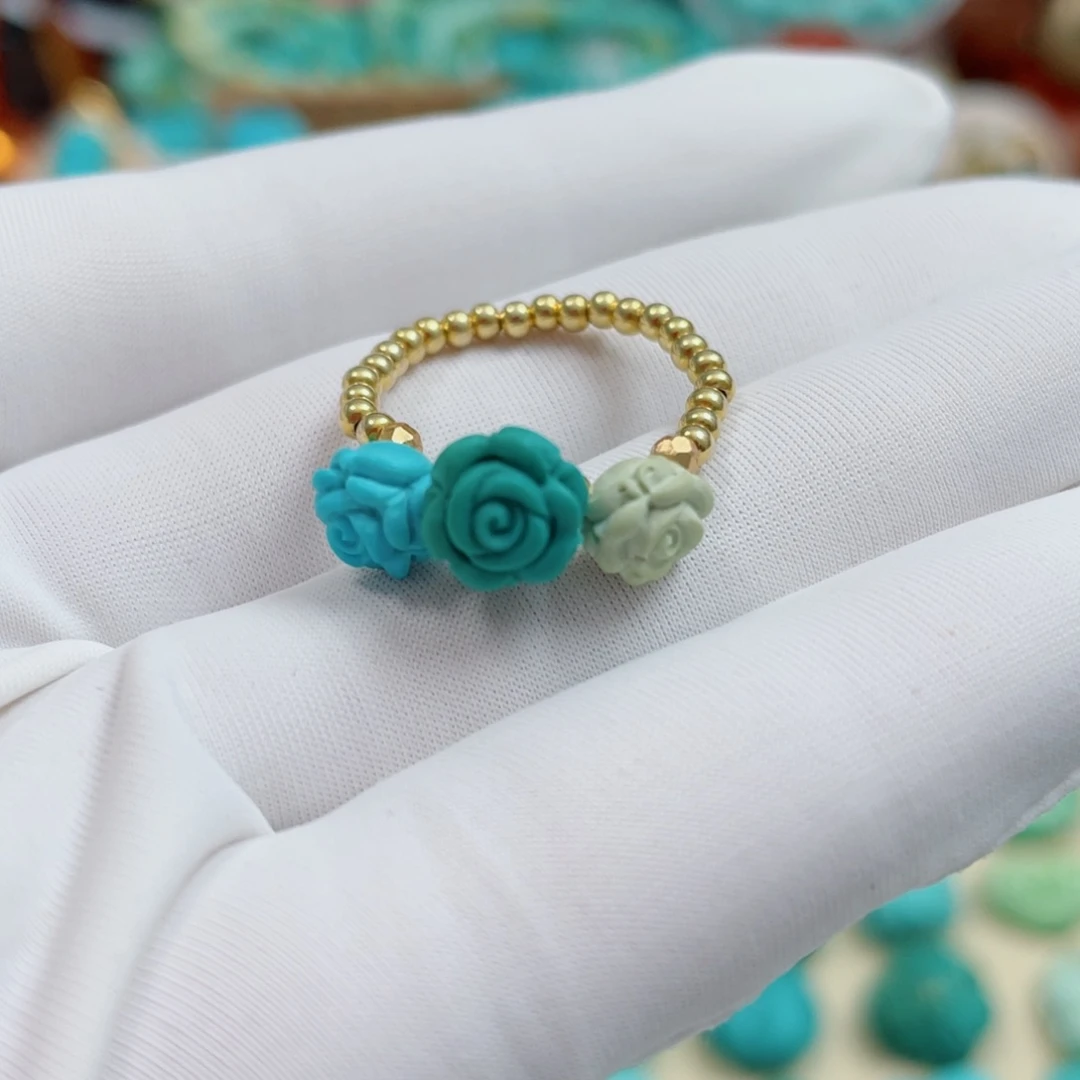 鄭***賢绿松石足铂镶嵌珠宝奇石