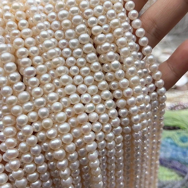 未镶嵌玛瑙/玉髓珠宝半成品一条5.5mm左右椭圆珍珠有生长纹