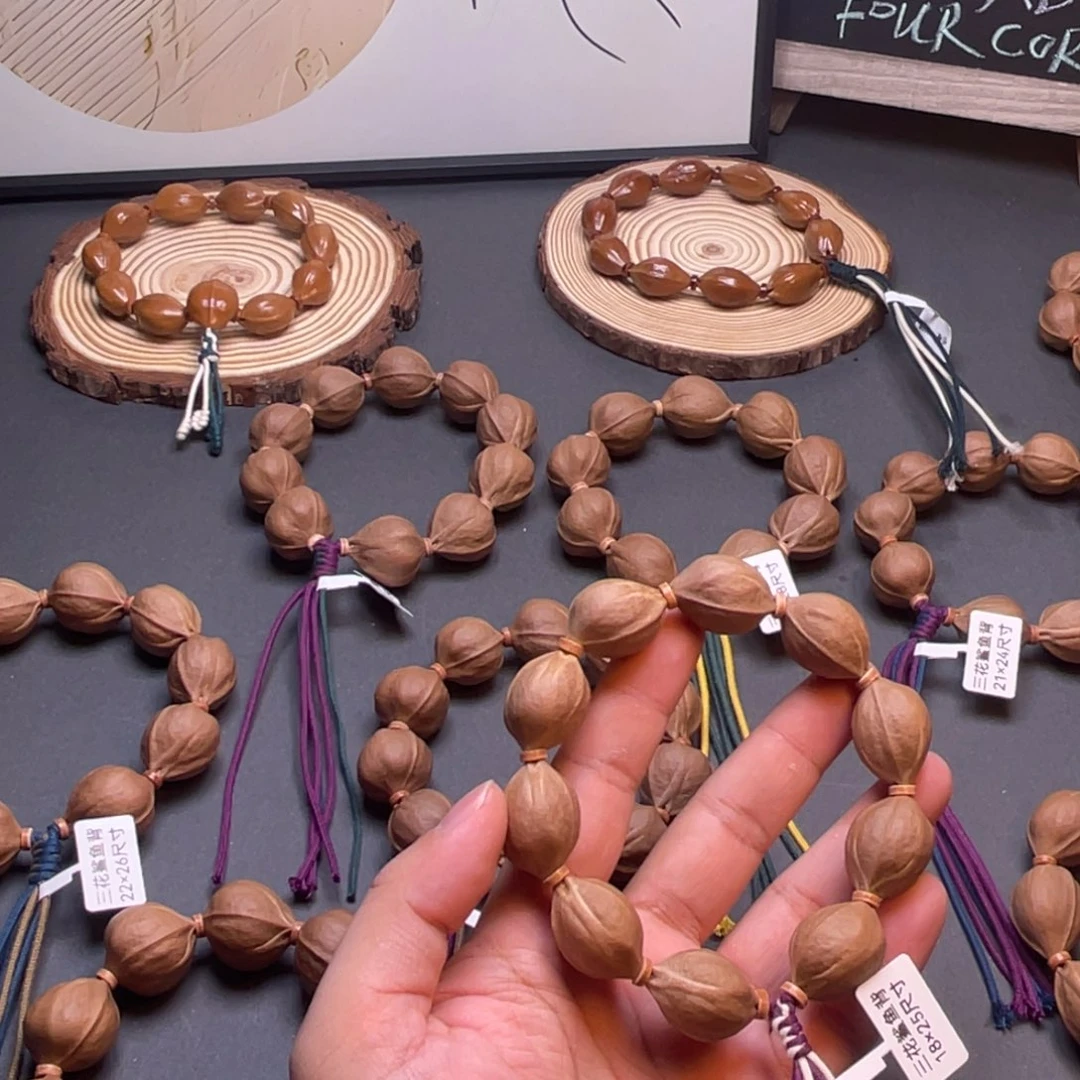 岳***岳橄榄核手串梅林铁核三花鲨鱼背原皮素串19×25尺寸