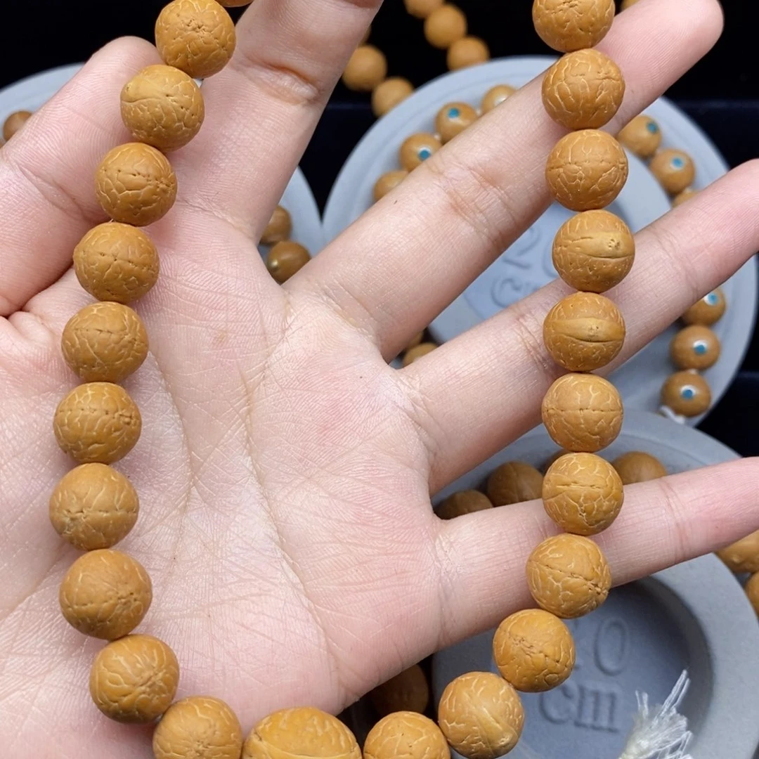 寒***山手串凤眼菩提12+新籽素手持