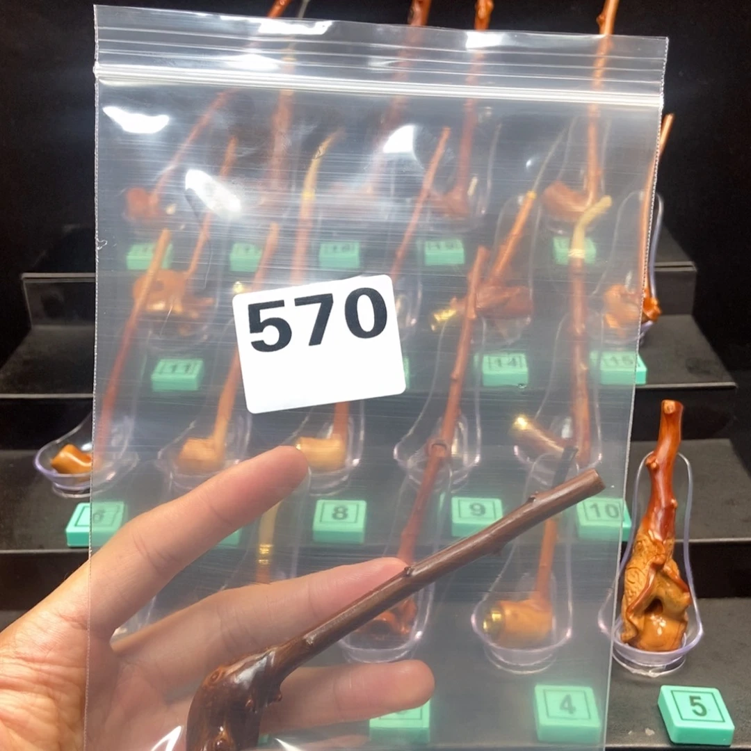 黑果木虎****）檬子木烟斗