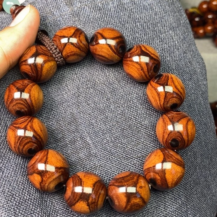 冷***神黄花梨/降香黄檀2.0紫油梨对眼对眼