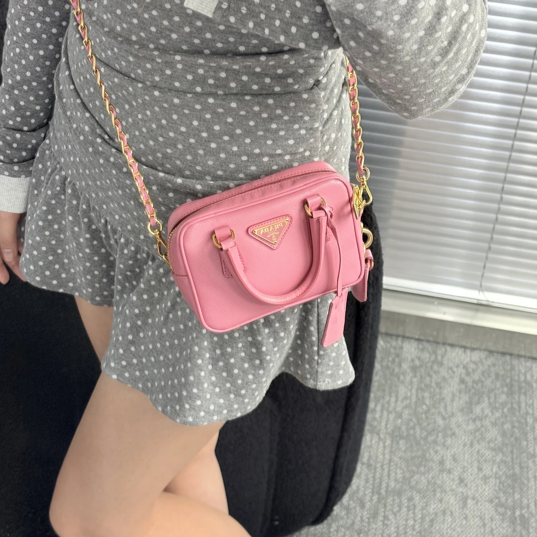 95新 Prada/普拉达 蜜桃粉小方包手提斜挎包cy