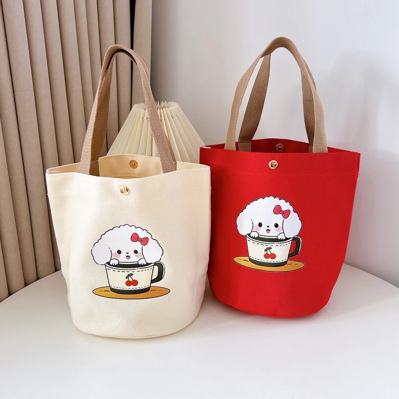 新款帆布包一体式水桶韩版休闲风通用手提包简约妈咪包便当包小包