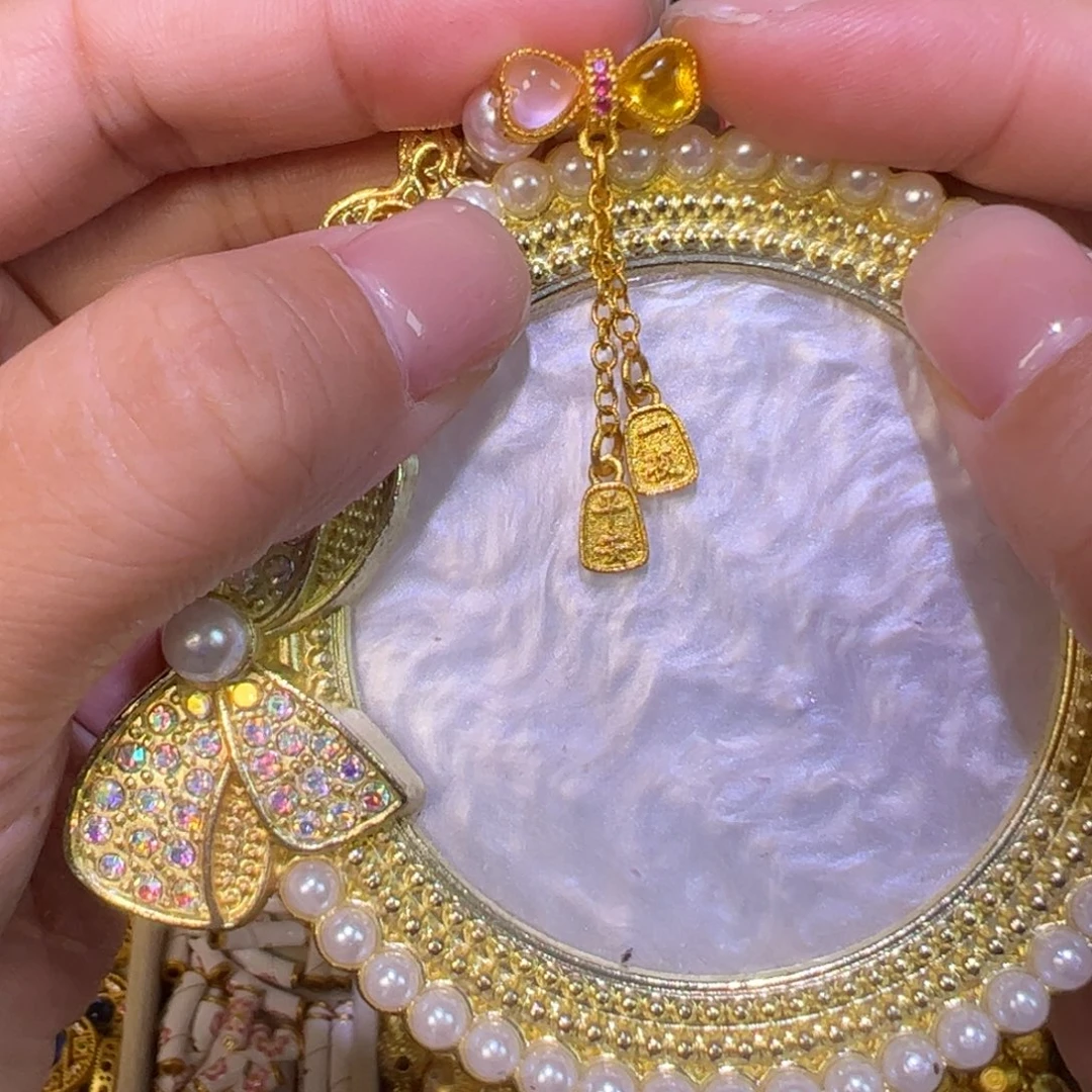 合金粉粉黄黄蝴蝶结流苏