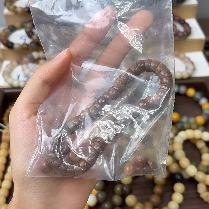 秋***花菩提根/象牙果手串卡0.9小肠微瑕