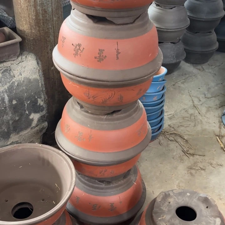 紫砂花盆    100-4。  36-16红