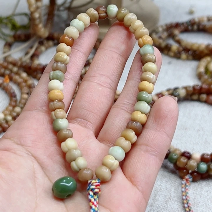 贴***贴龙脊菩提手串屁桃