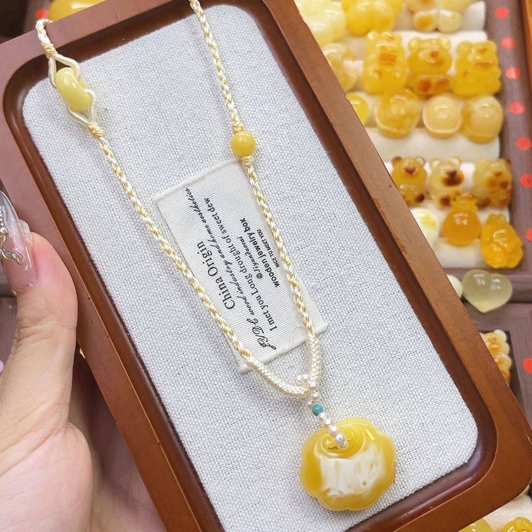 裸石琥珀未镶嵌平安锁吊坠