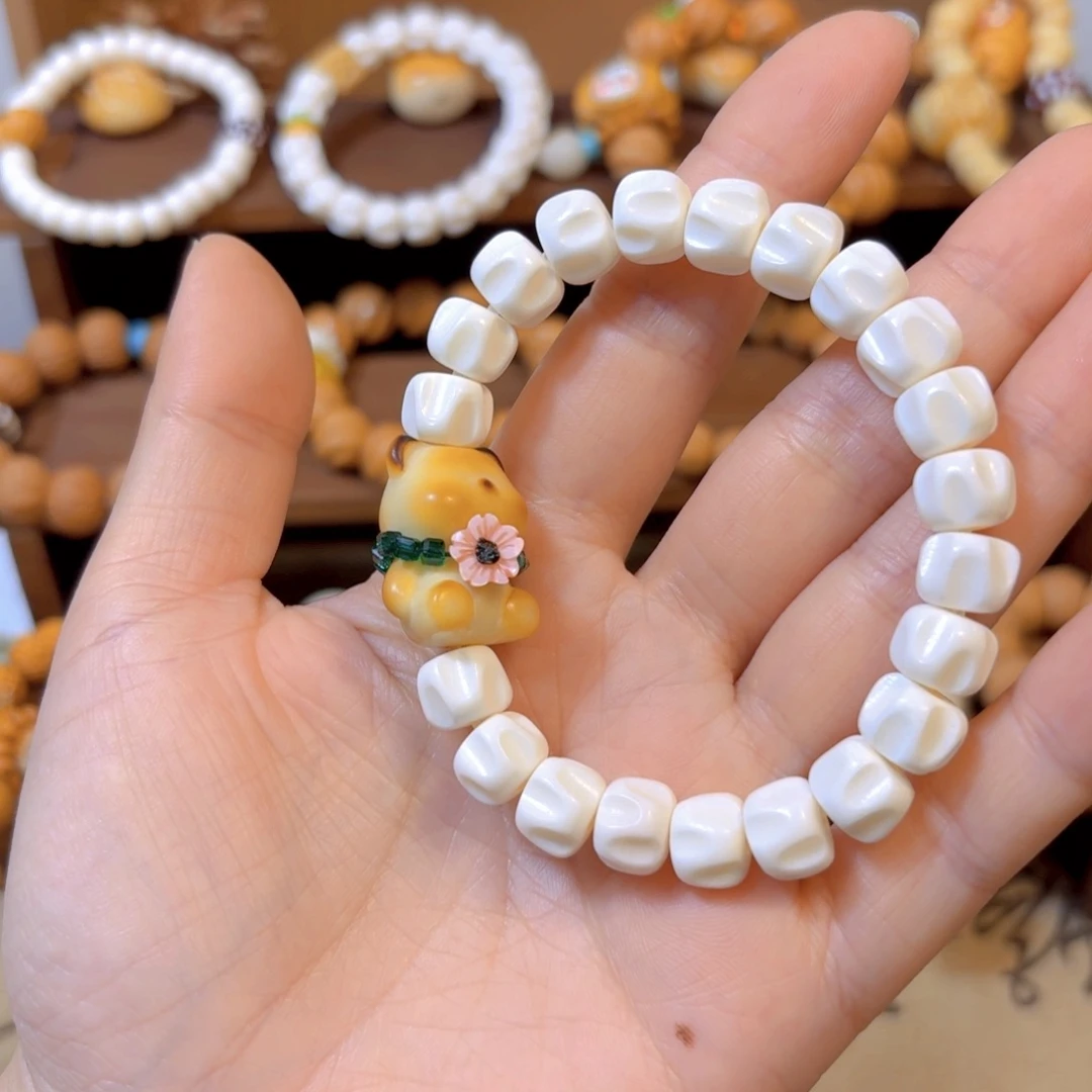 星月菩提手串驼骨百香籽象牙果小熊