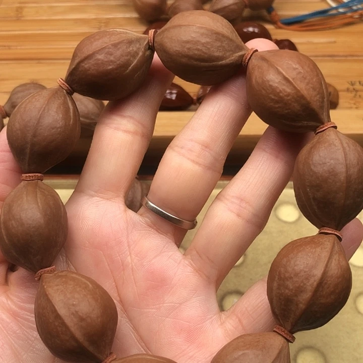 ****࿐橄榄核手串梅林铁21 X30大手持