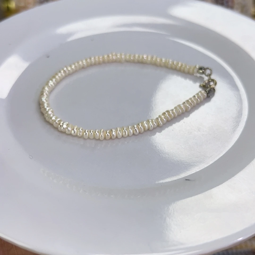 手绳淡水珍珠钛钢