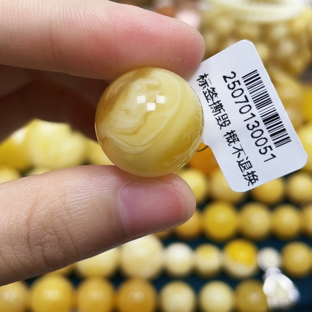 琥珀未镶嵌裸石19.2mm.瑕