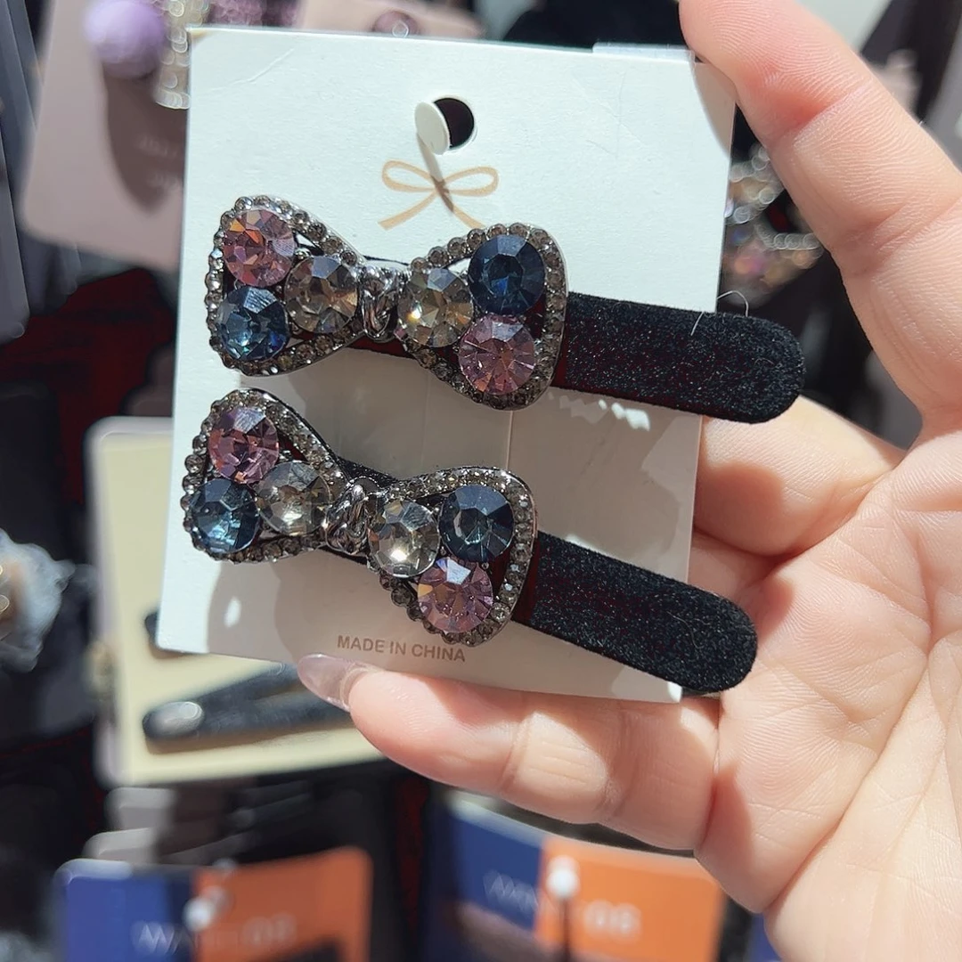 非金属三色钻钻蝴蝶结黑色鸭夹一对