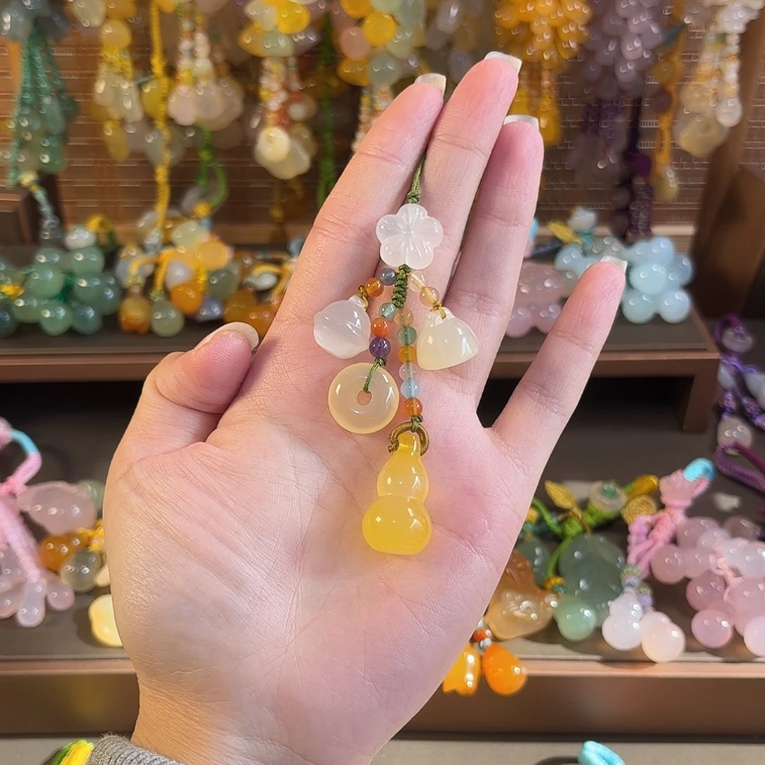 莲****玛瑙/玉髓未镶嵌车挂手机链