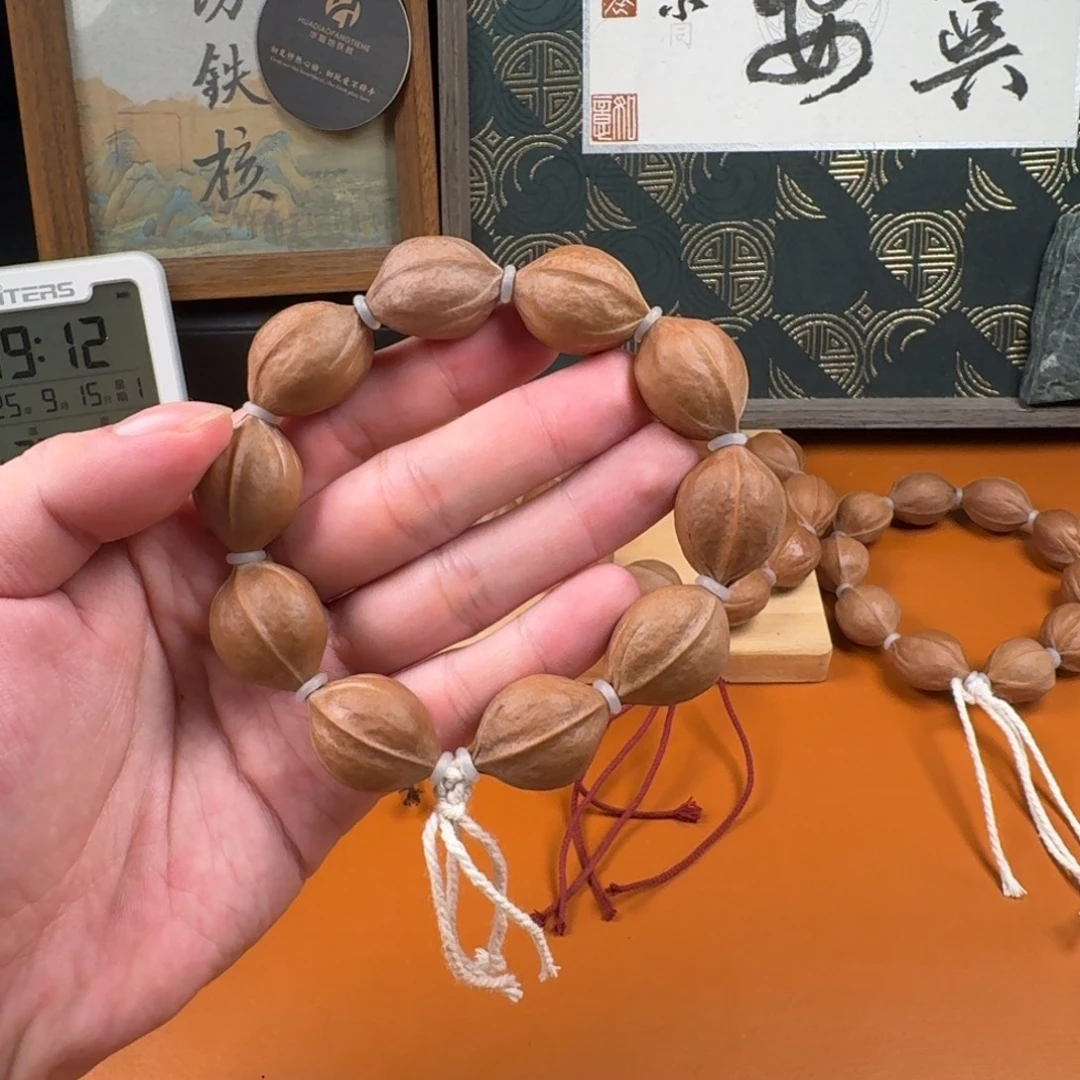 手串橄榄核19.26梅林铁核