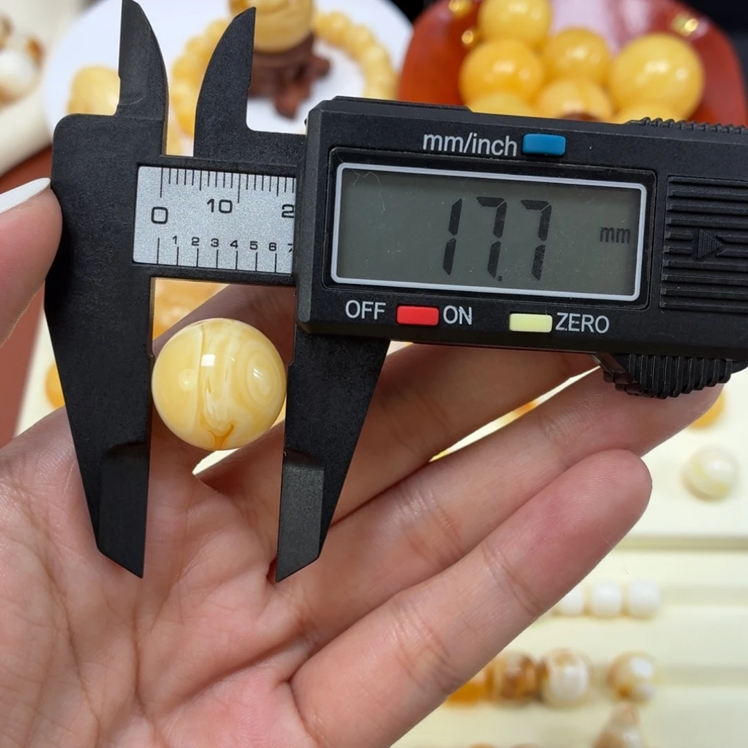 琥珀未镶嵌珠宝奇石焦皮奶橘双瞳溶洞圆珠17.7mm