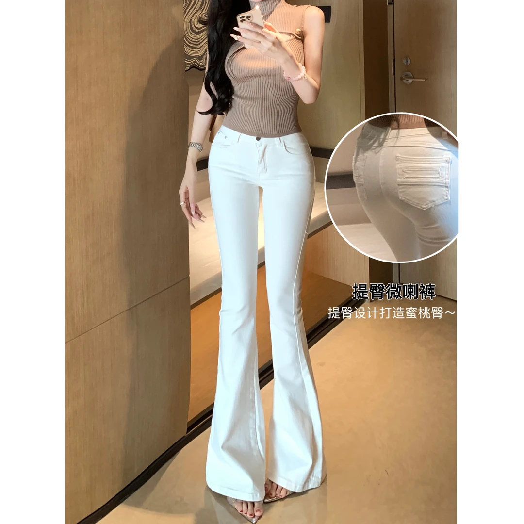 气质韩女长腿微喇小白裤2025秋季新款高腰修身显瘦提臀喇叭牛仔裤