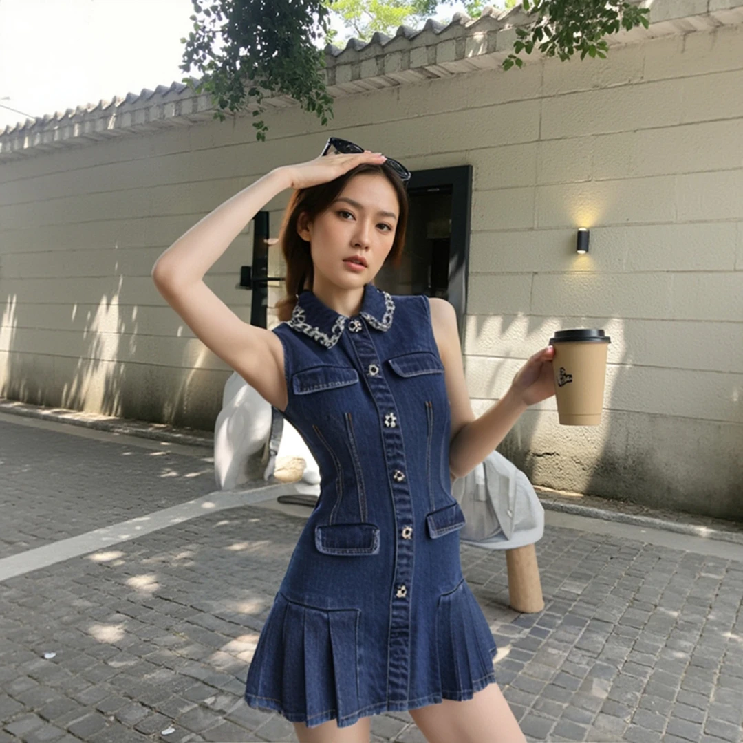 简约轻熟风高级钉珠翻领无袖单排扣百褶牛仔连衣裙女MU3439