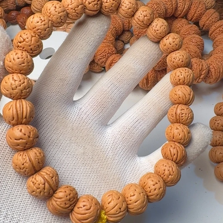 桃核吊坠树王纽扣手持