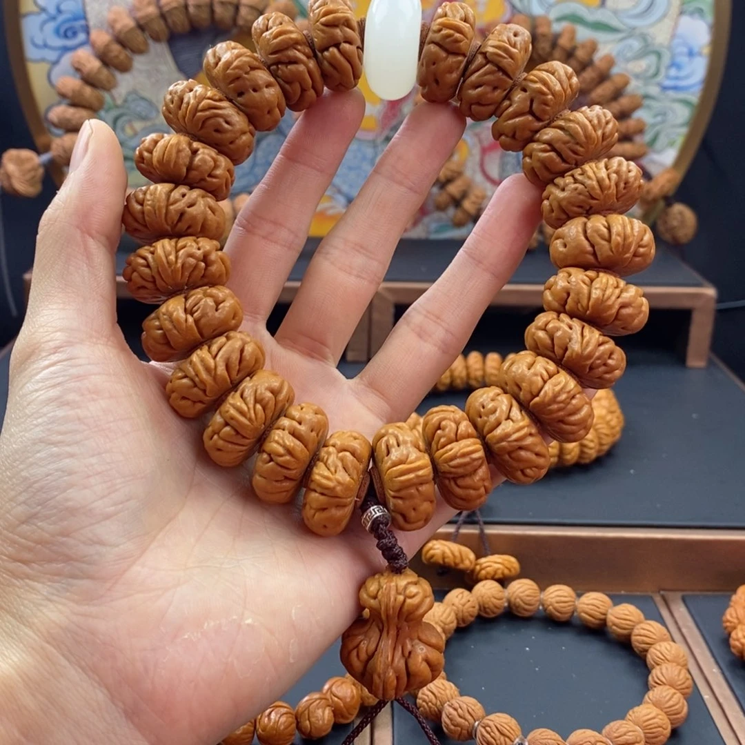 桃核手串龙纹桃核白玉龙