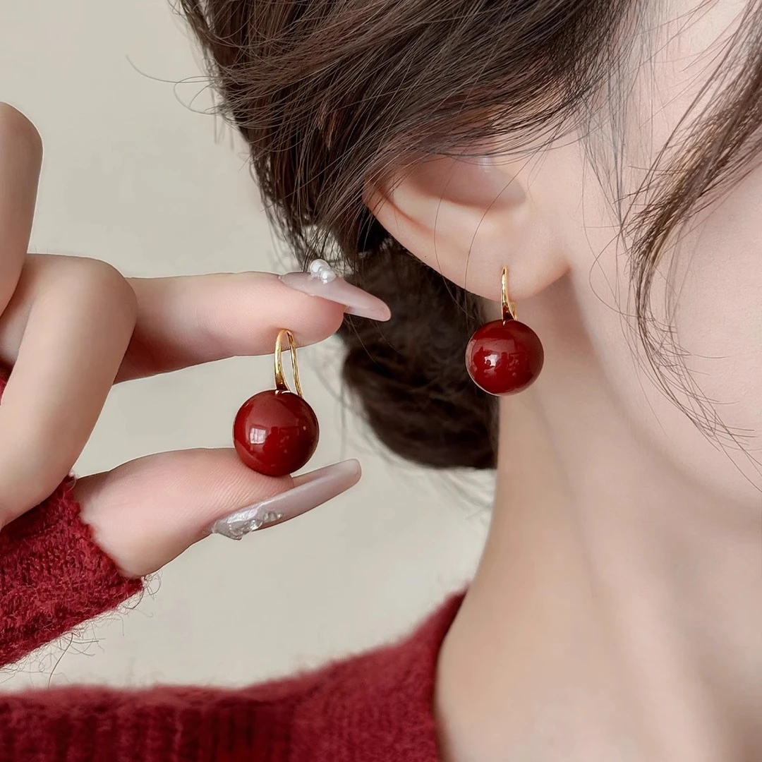 铜合金耳饰 新年红色珠珠耳环女小众设计感耳钩2025新款爆款耳饰