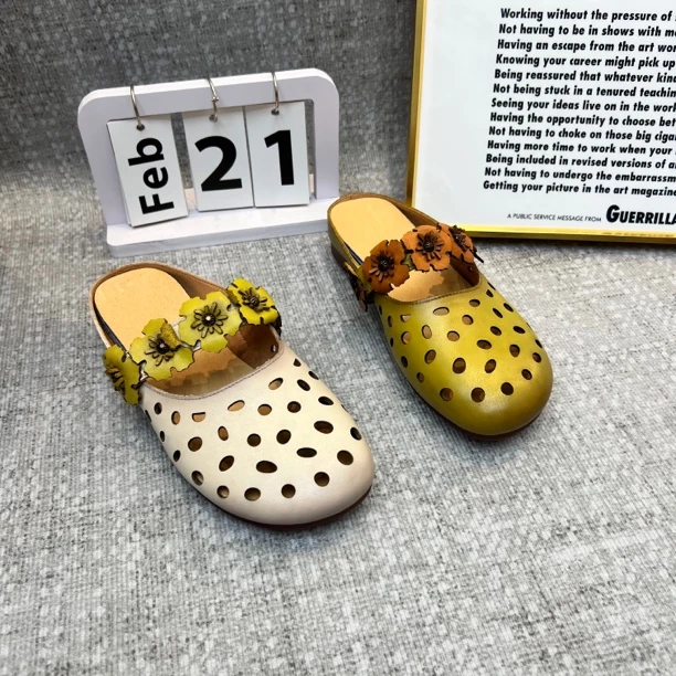 6362夏季新款真皮镂空舒适花朵复古民族风包头皮拖