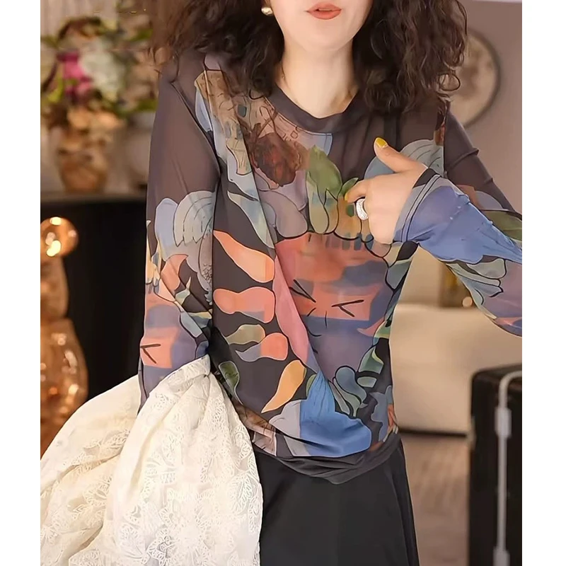 2025秋季设计太阳感晕染印花网纱女长袖T恤时尚休闲宽松套头