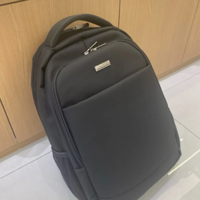 跨境风潮灰色商务通勤轻便大号男女双肩包大学生时尚双肩背黑色