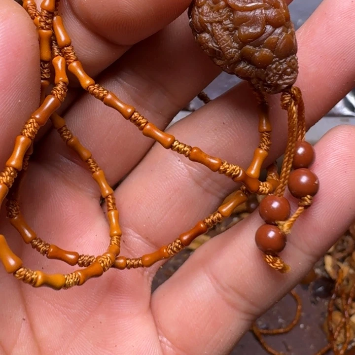 吊坠橄榄核你的电话