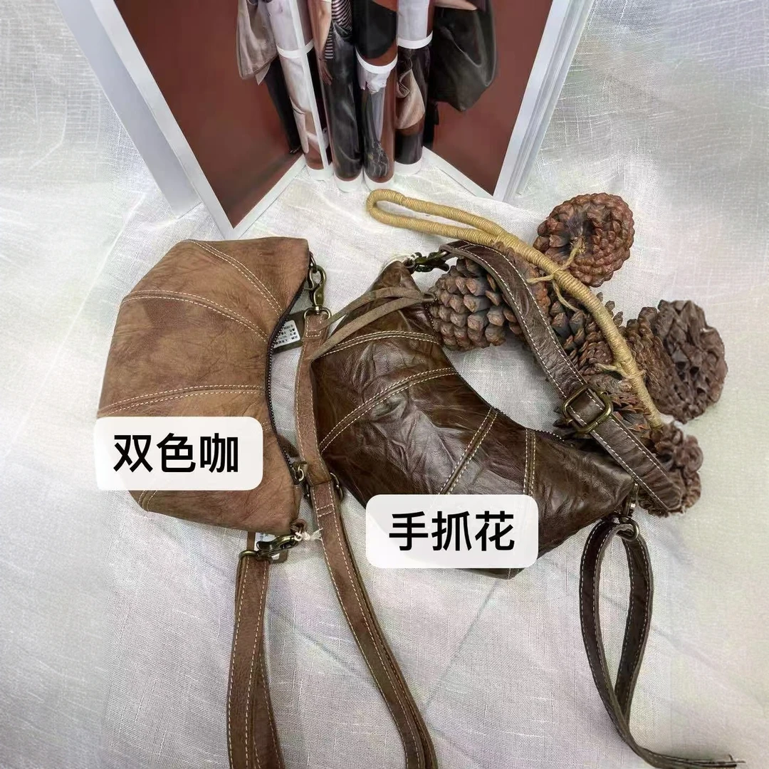 90700人类联盟复古手爪花牛皮包包