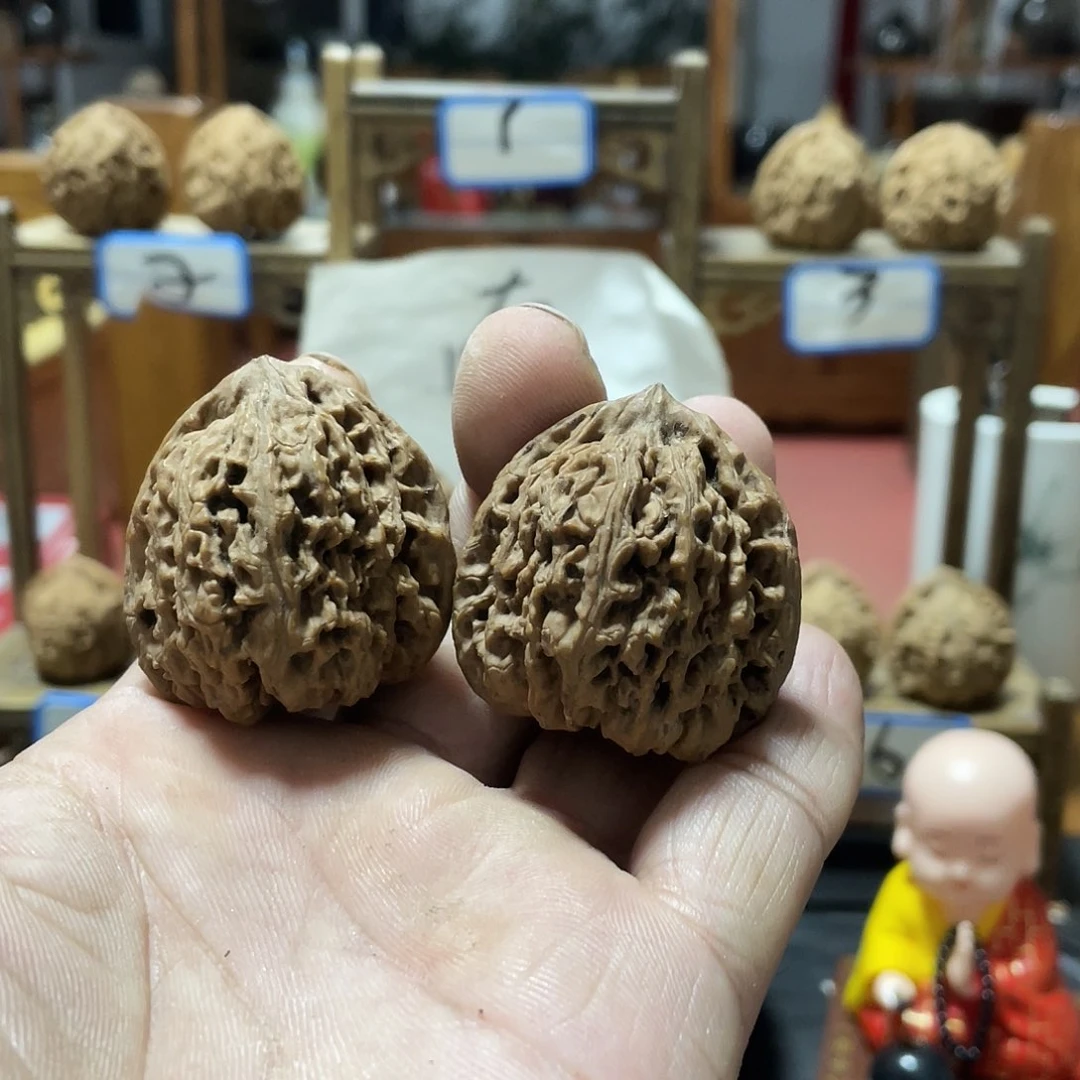 余***晓桃核吊坠文玩核桃南将石