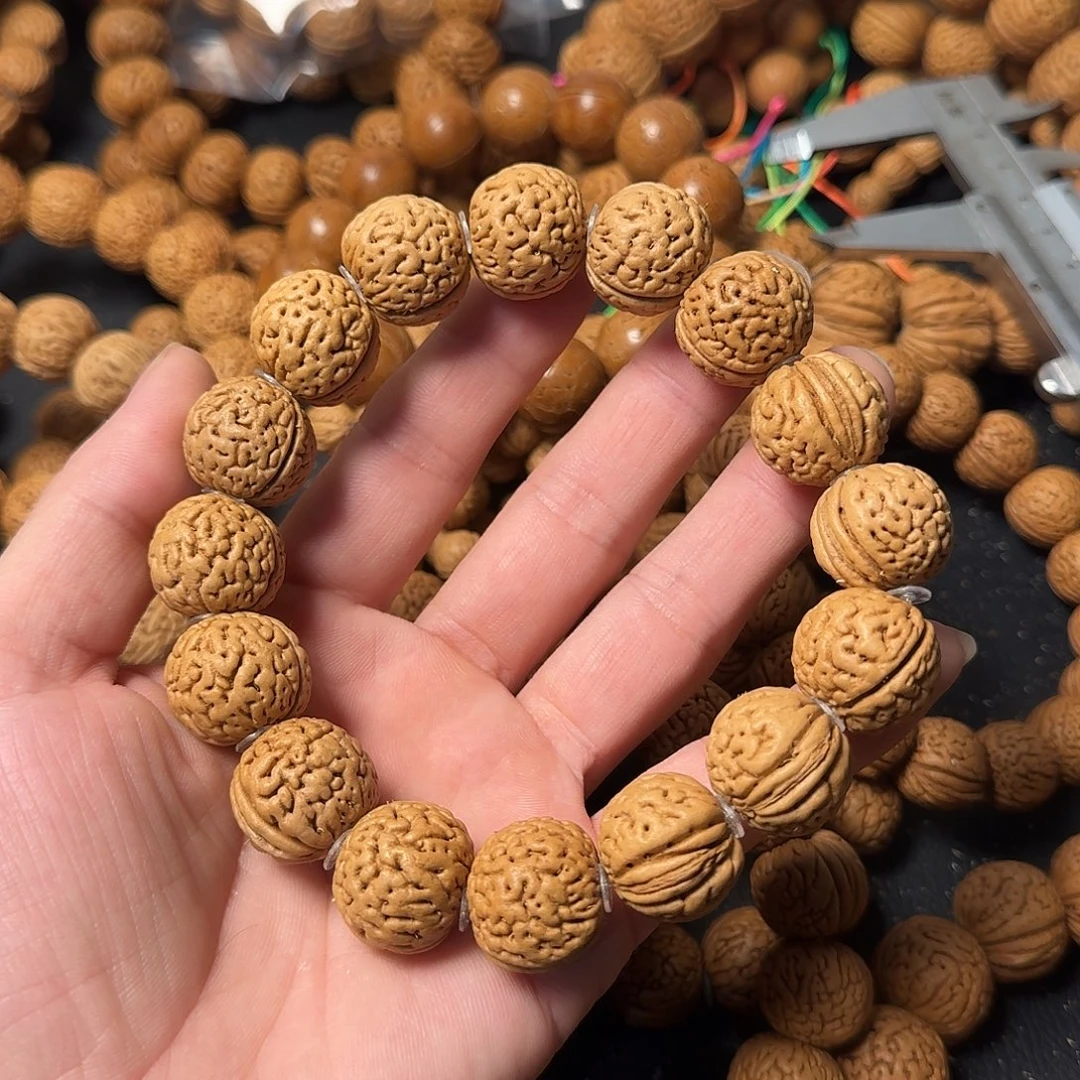 十***晶吊坠桃核野生手串