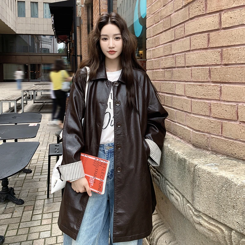 巨好看条纹拼接翻领风衣式皮衣外套女春秋季2025新款韩系绝美大衣