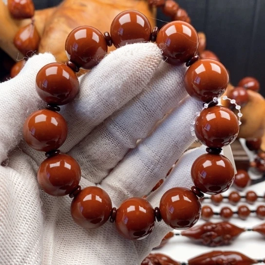 橄榄核手串人**态我想知道