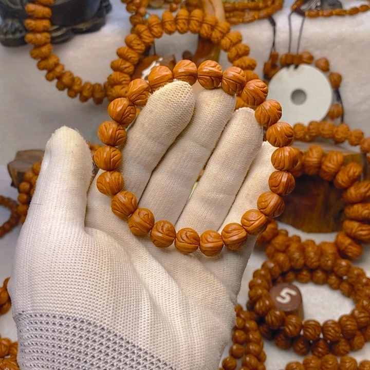 桃核手串夏****哥红皮玉龙脊单圈