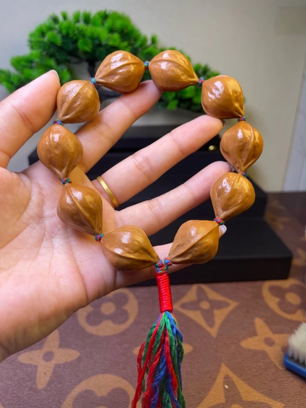 橄榄核雕2.1蒜头手持10颗