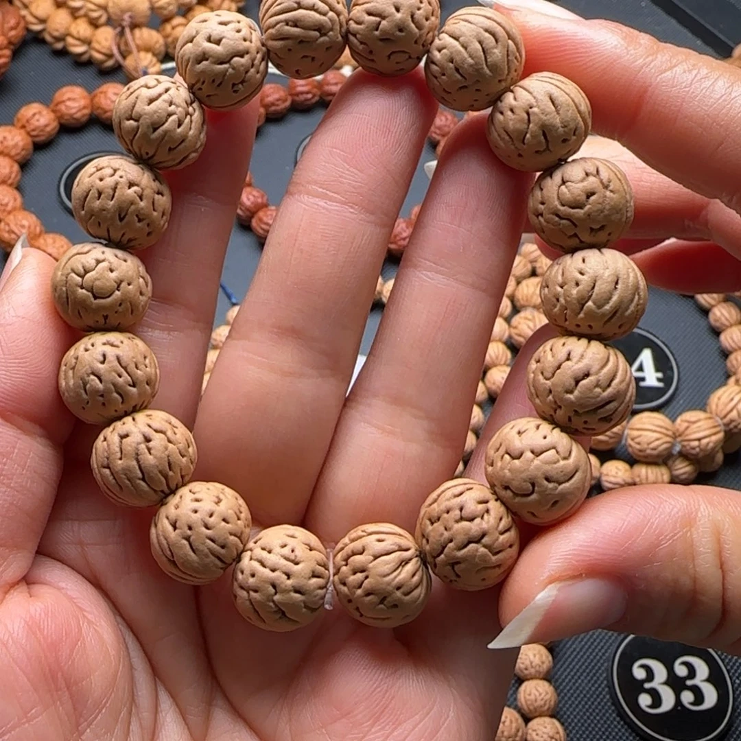 窦***生桃核手串肌肉纹桃核手串