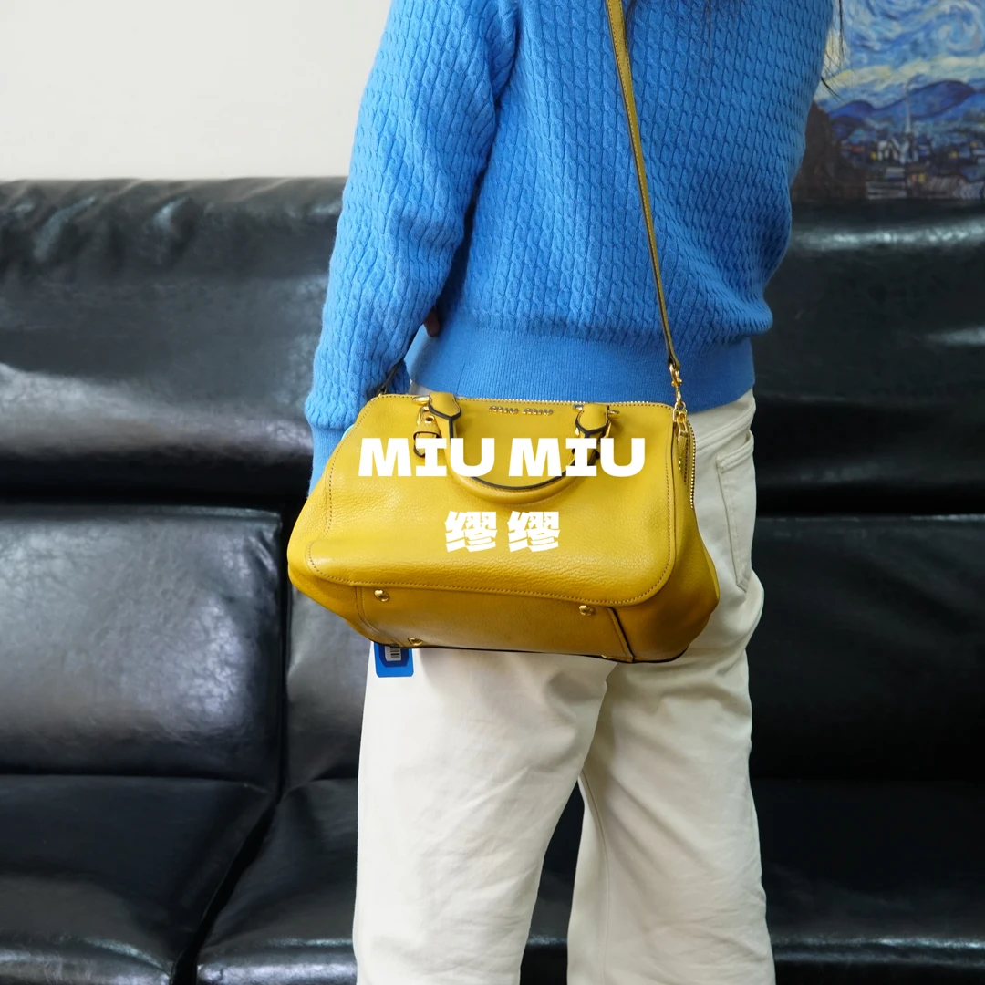 95新 MIU MIU/缪缪 miumiu/黄色斜挎包/SH01617023/7023