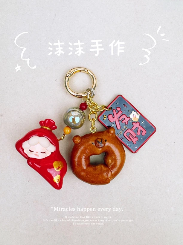 萌粒手机链手机防摔挂绳可爱轻奢包挂