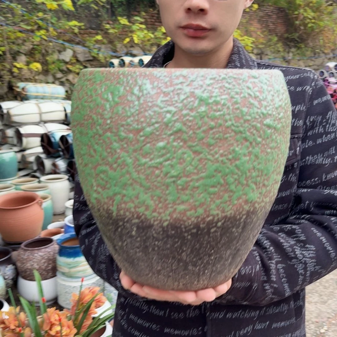紫砂花盆口24.5高27（一个牛油果树叶