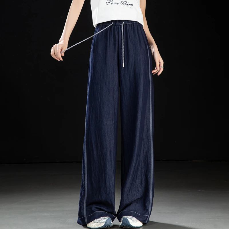 深蓝牛仔裤女2025春夏款松紧腰宽松显瘦条纹阔腿裤垂感百搭直筒裤