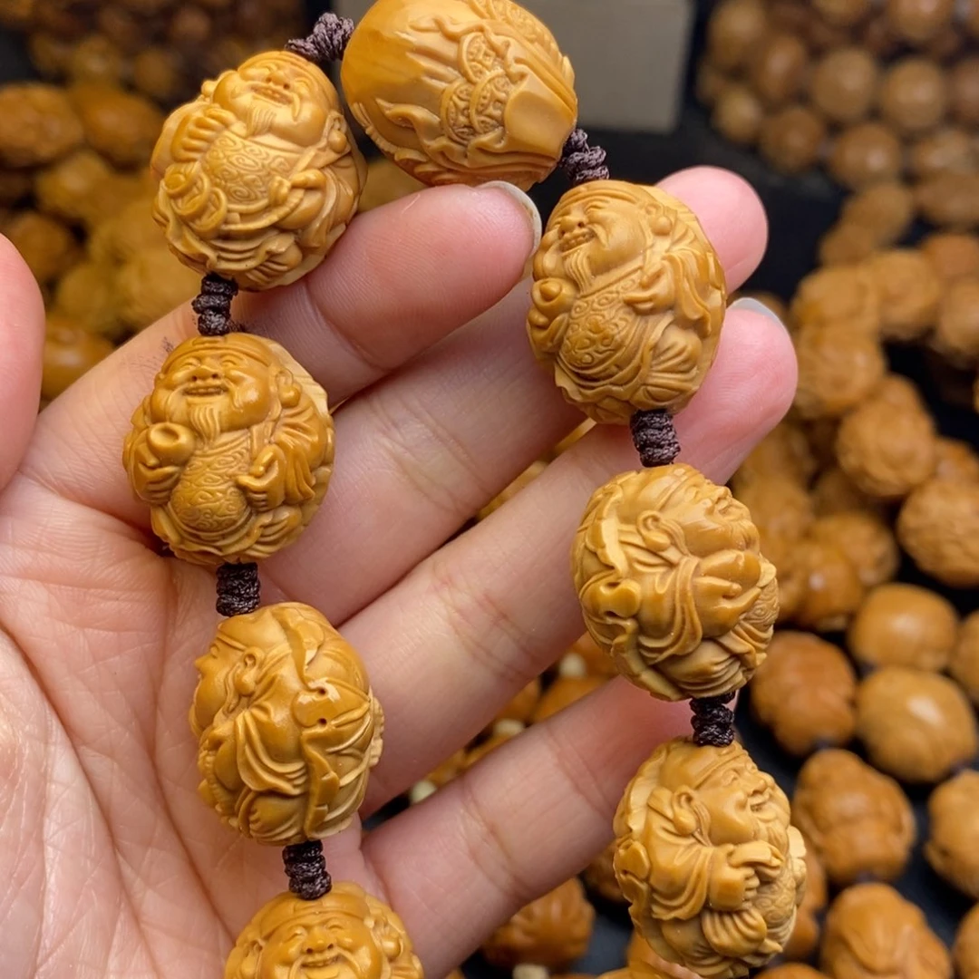 橄榄核吊坠荷叶财神1.8