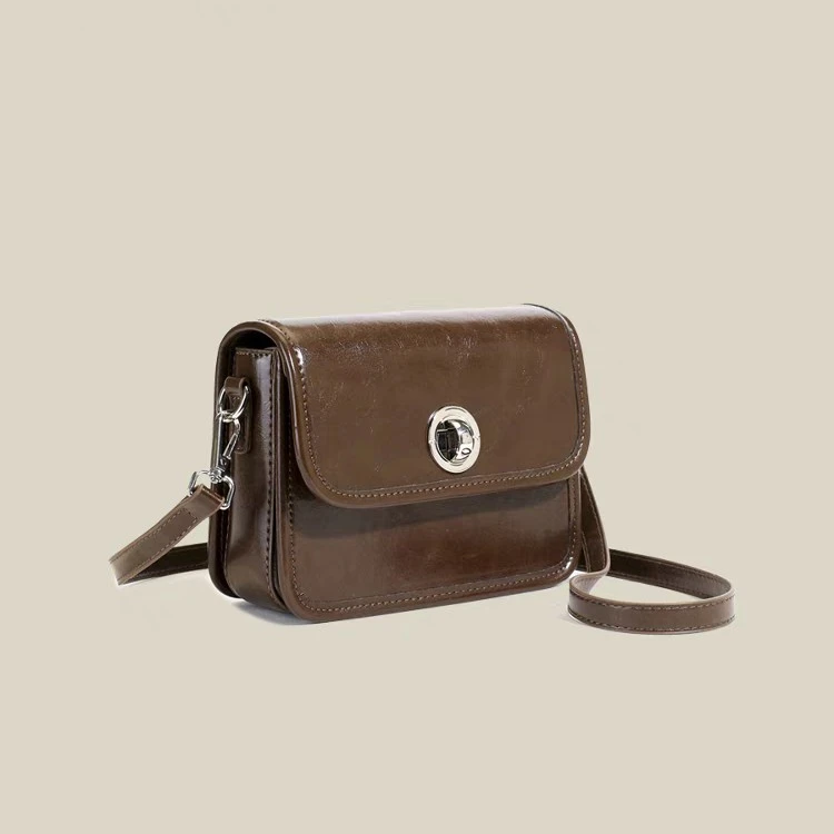 牛皮小金锁单肩腋下包小包包2025新款复古百搭时尚斜跨包马鞍包