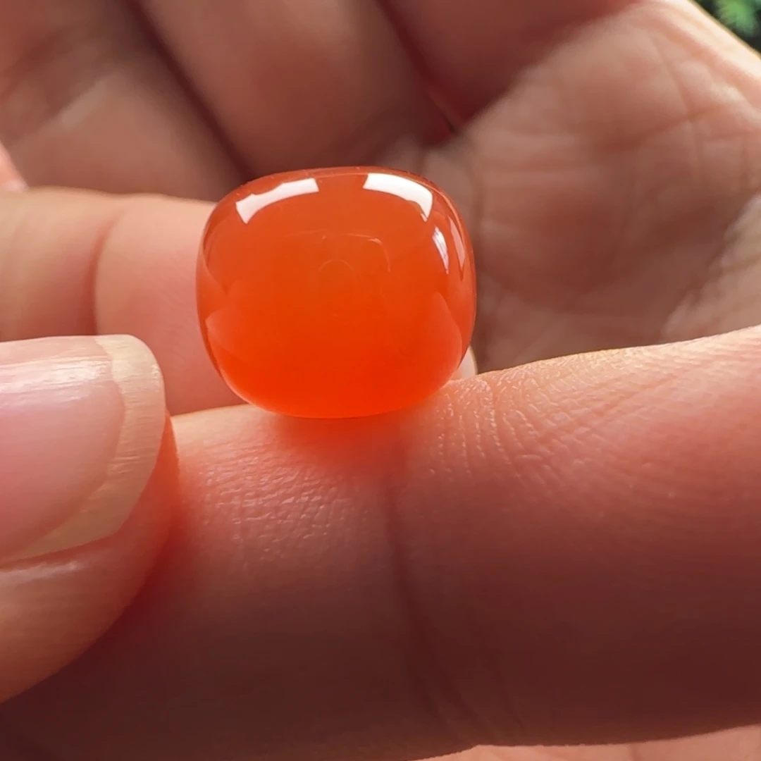 哈***哈南红玛瑙未镶嵌老型：11.1x9.4冰橘 高冰 有水线